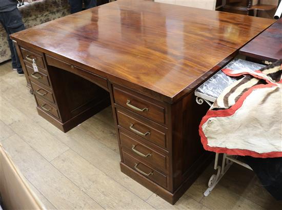 A 1950s mahogany partners desk W.159.5cm